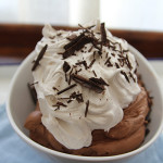 Vegan chocolate mouse with orange vanilla bean whipped créme
